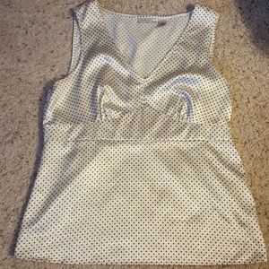 White polka dot sleeveless blouse